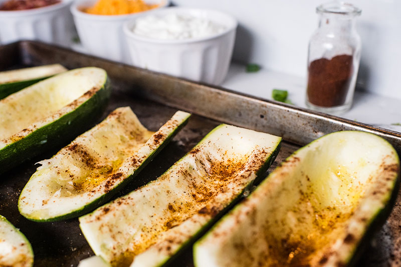 sliced zucchini on a baking sheet
