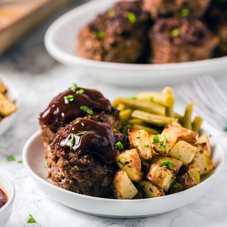 plate of meatloaf muffins, roasted potatoes, and green beans