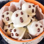 orange bowl filled with ghost oreo balls