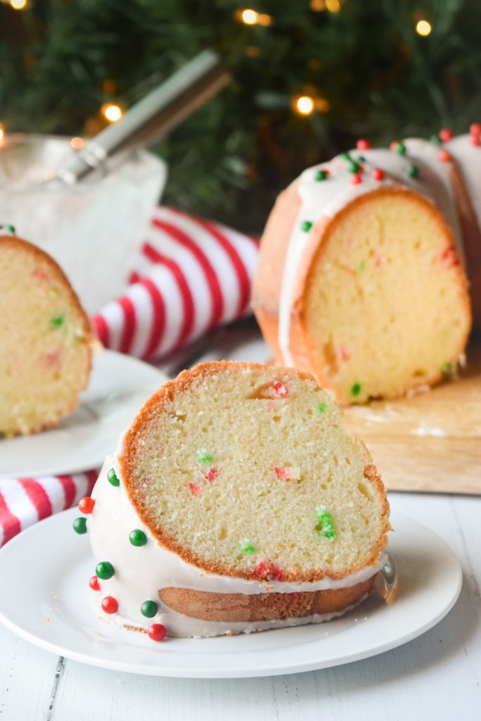 slice of christmas bundt cake on a white plate