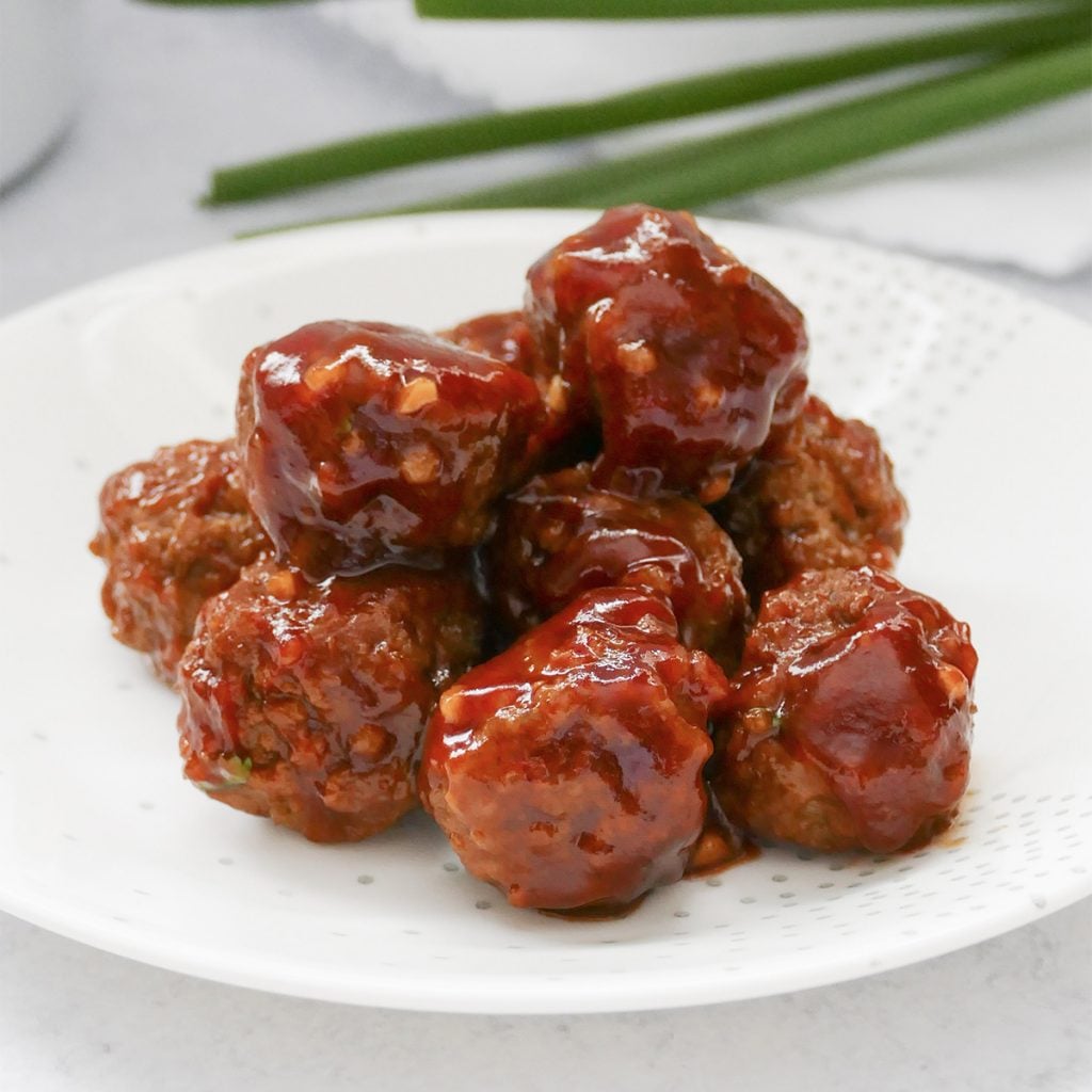 sweet & spicy slow cooker meatballs on a plate