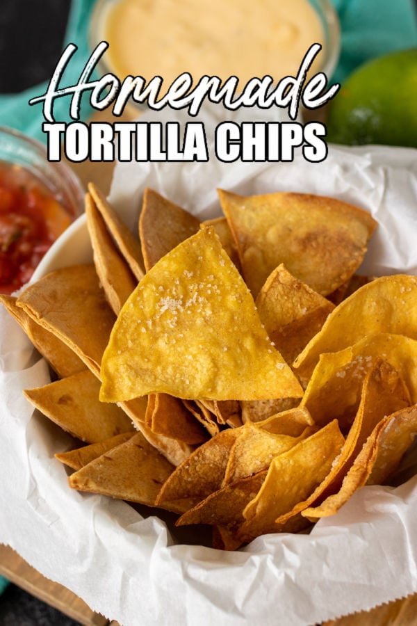 basket of tortilla chips with text overlay reading "homemade tortilla chips"