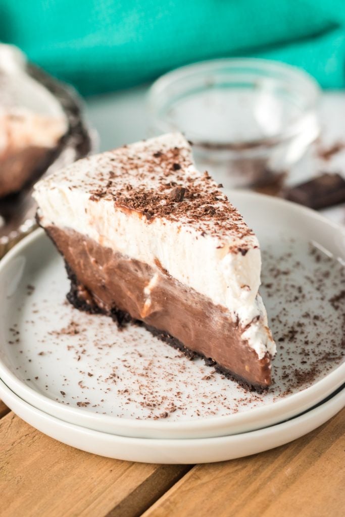 slice of chocolate cream pie on a white plate