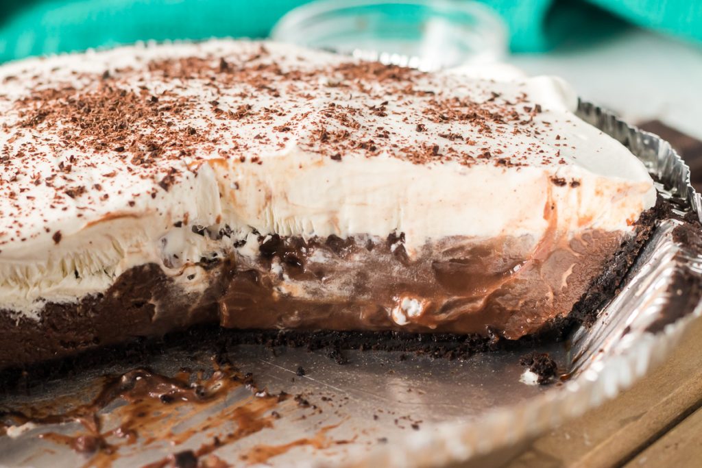 inside of a chocolate cream pie with a slice taken out