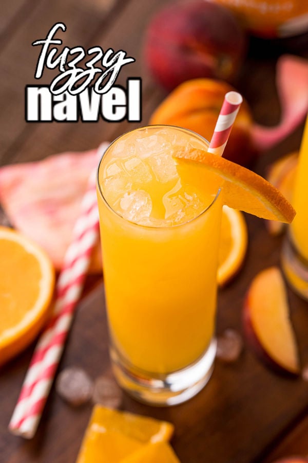 tall glass of fuzzy navel with text overlay reading "fuzzy navel"