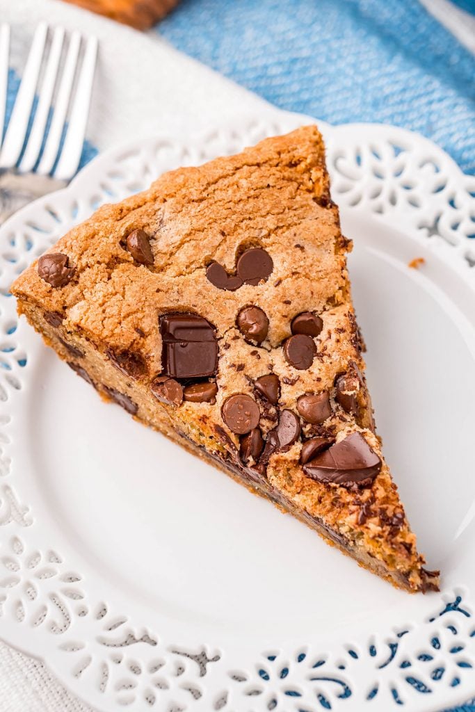 slice of chocolate chip skillet cookie on a white plate
