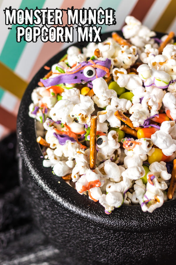 monster munch popcorn mix in a cauldron with text overlay reading "monster munch"