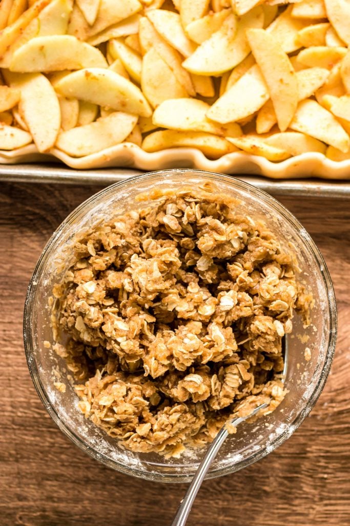 oat crumble in a bowl to top apple slab pie