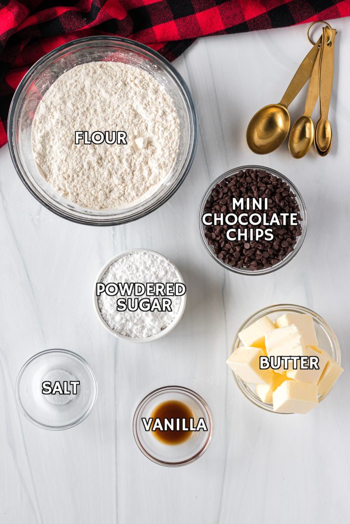 overhead shot of ingredients laid out to make chocolate chip snowball cookies