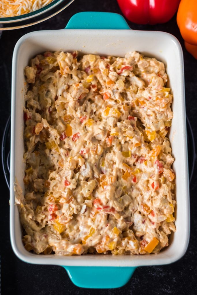 chicken fajita casserole spread in a baking dish