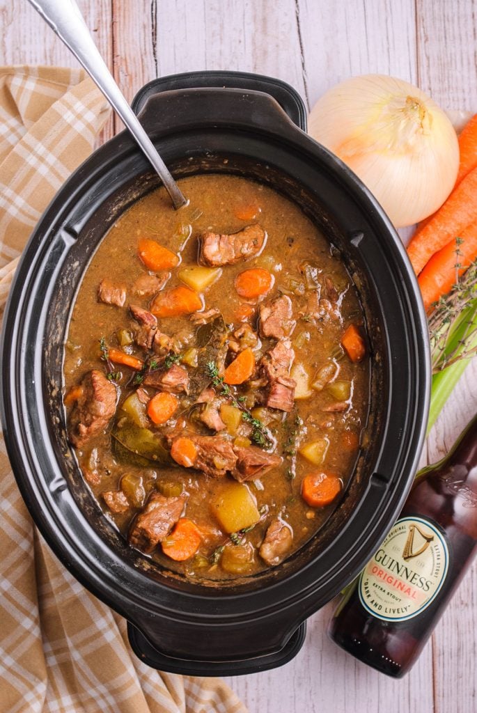 overhead shot of guinness beef stew in the crockpot.