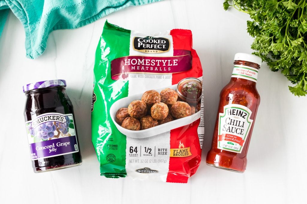 overhead shot of jelly, frozen meatballs, and heinz chili sauce.