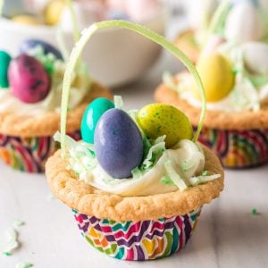 easter basket cookie cup filled with colorful M&Ms.