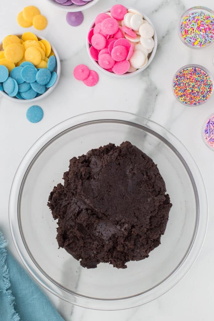 overhead shot of crushed Oreos in a mixing bowl.