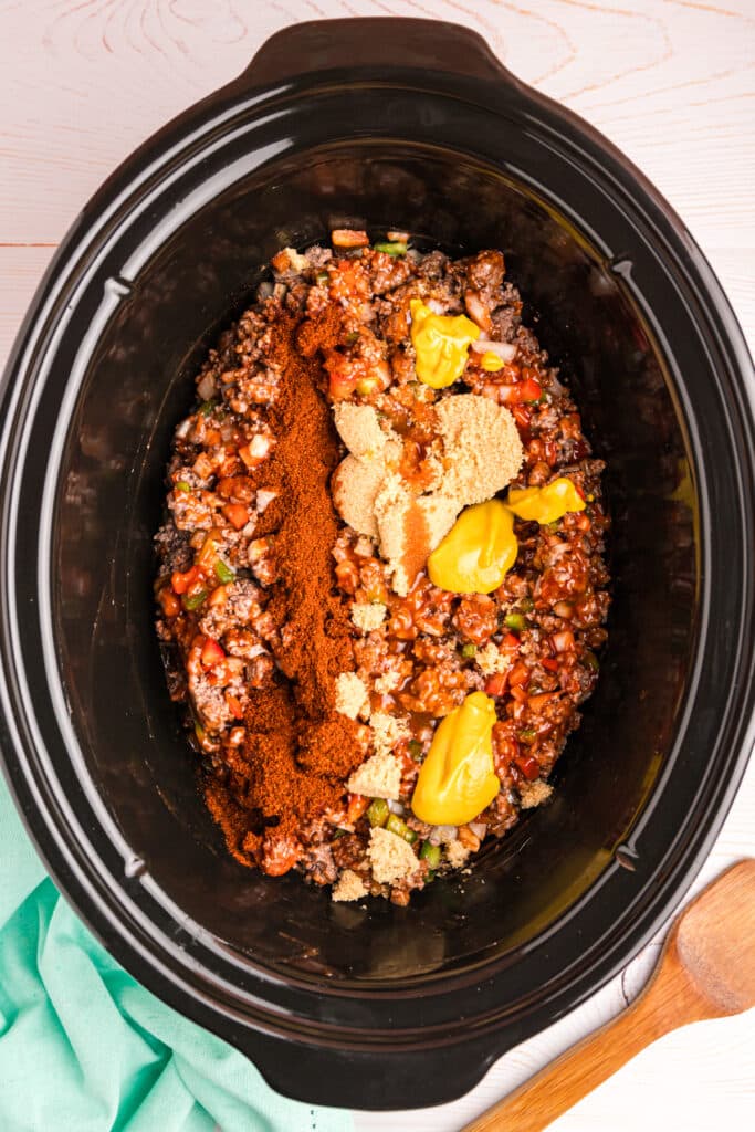 overhead shot of slow cooker with sloppy joe ingredients.