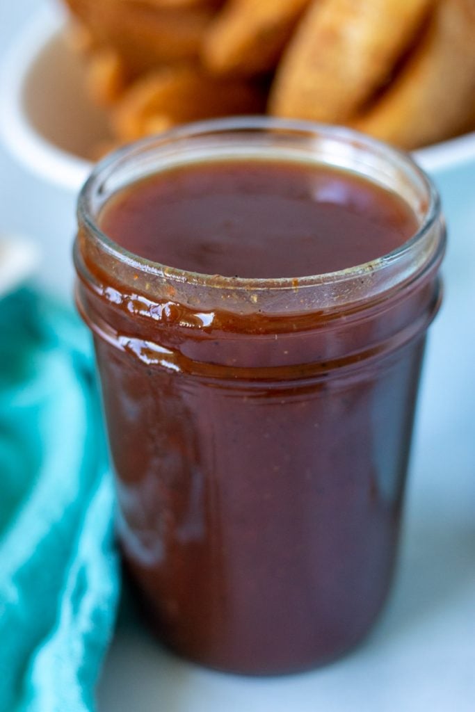 mason jar full of spicy bbq sauce.