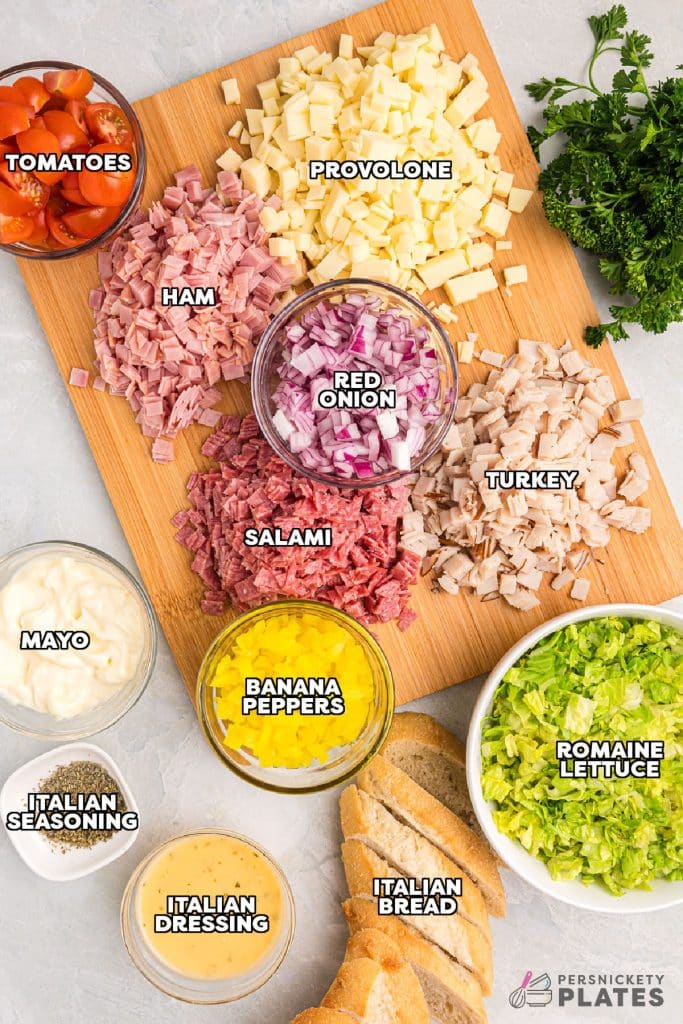 overhead shot of labeled ingredients laid out to make hoagie dip.