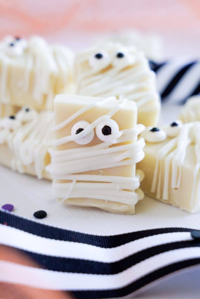 stack of halloween fudge with candy eyeballs.