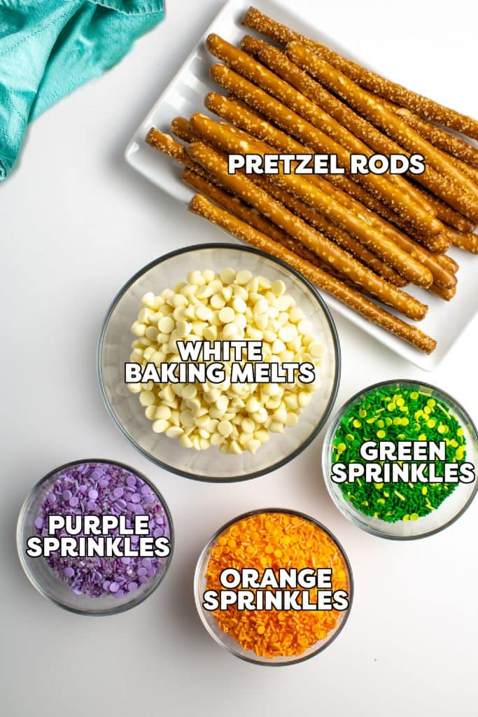 overhead shot of labeled ingredients to make chocolate covered pretzel rods.