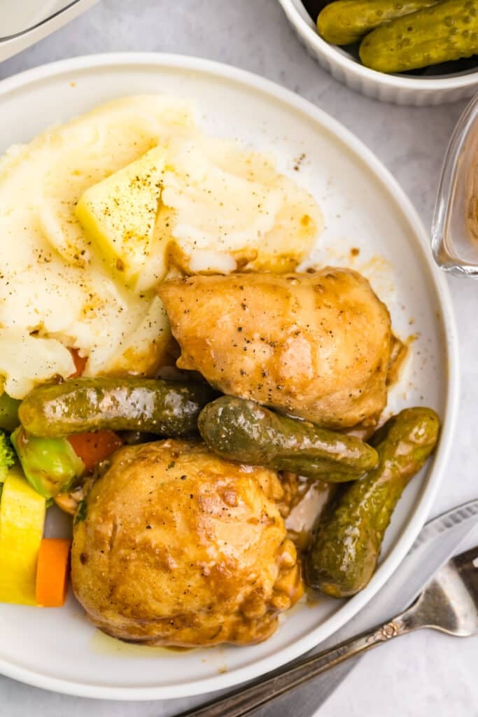 overhead shot of plate of pickle chicken with potatoes.