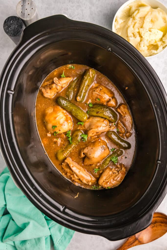 overhead shot of crockpot pickle chicken in a crockpot.