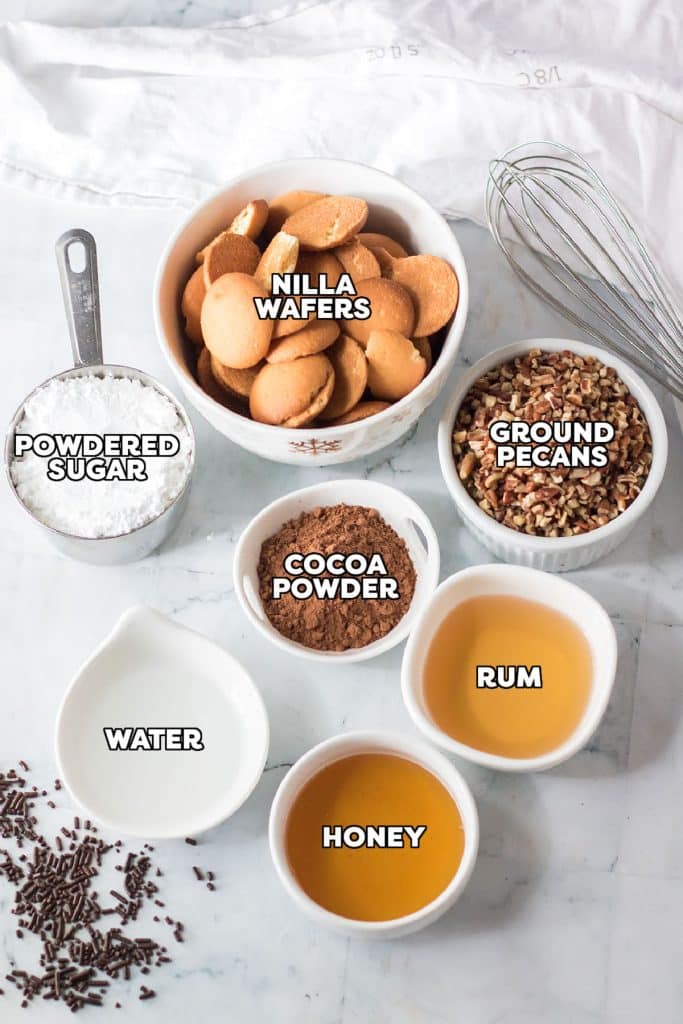 overhead shot of labeled ingredients laid out to make rum balls.