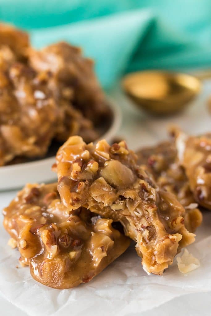 praline pecan cookie with a bite missing.