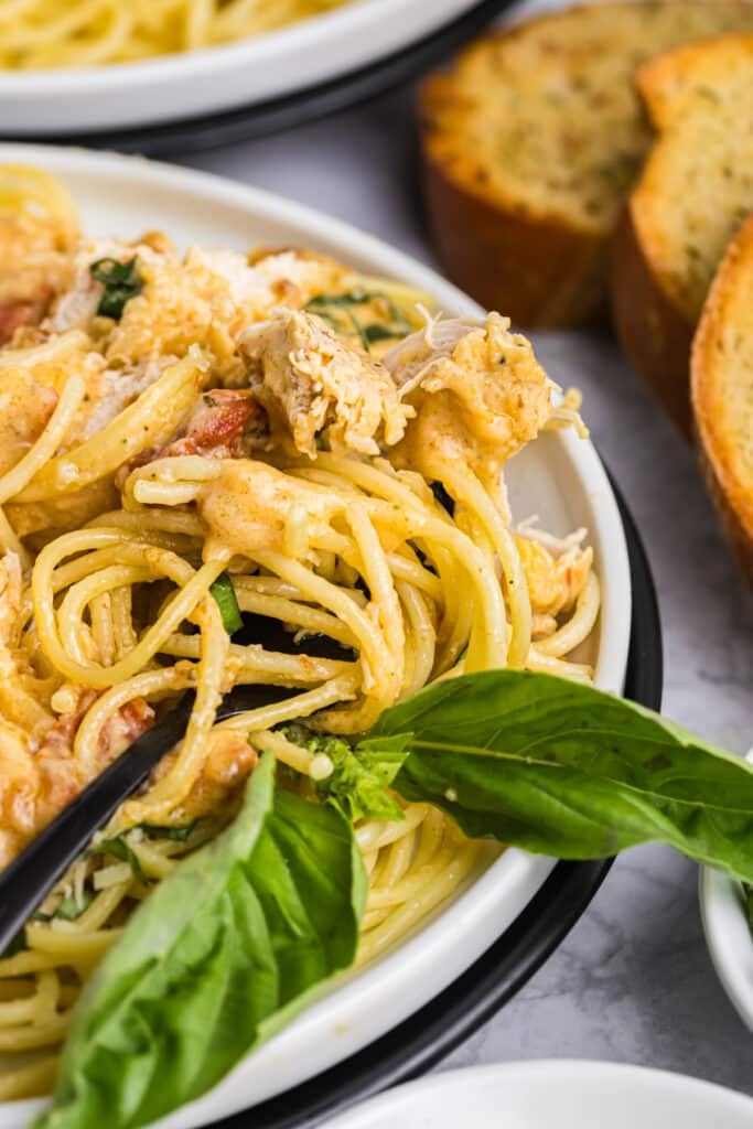 fork getting a bite of marry me chicken pasta.