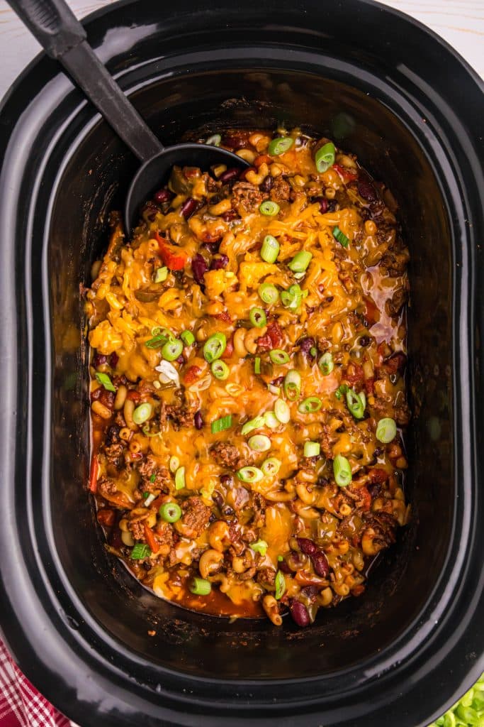 overhead shot of chili mac in a slow cooker.
