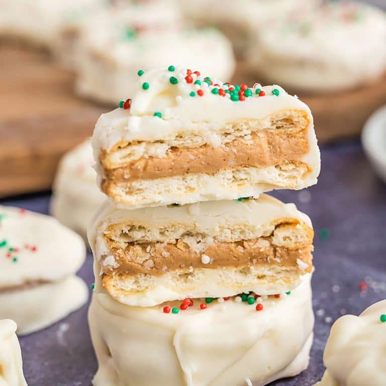 a stack of ritz peanut butter cookie crackers cut in half.