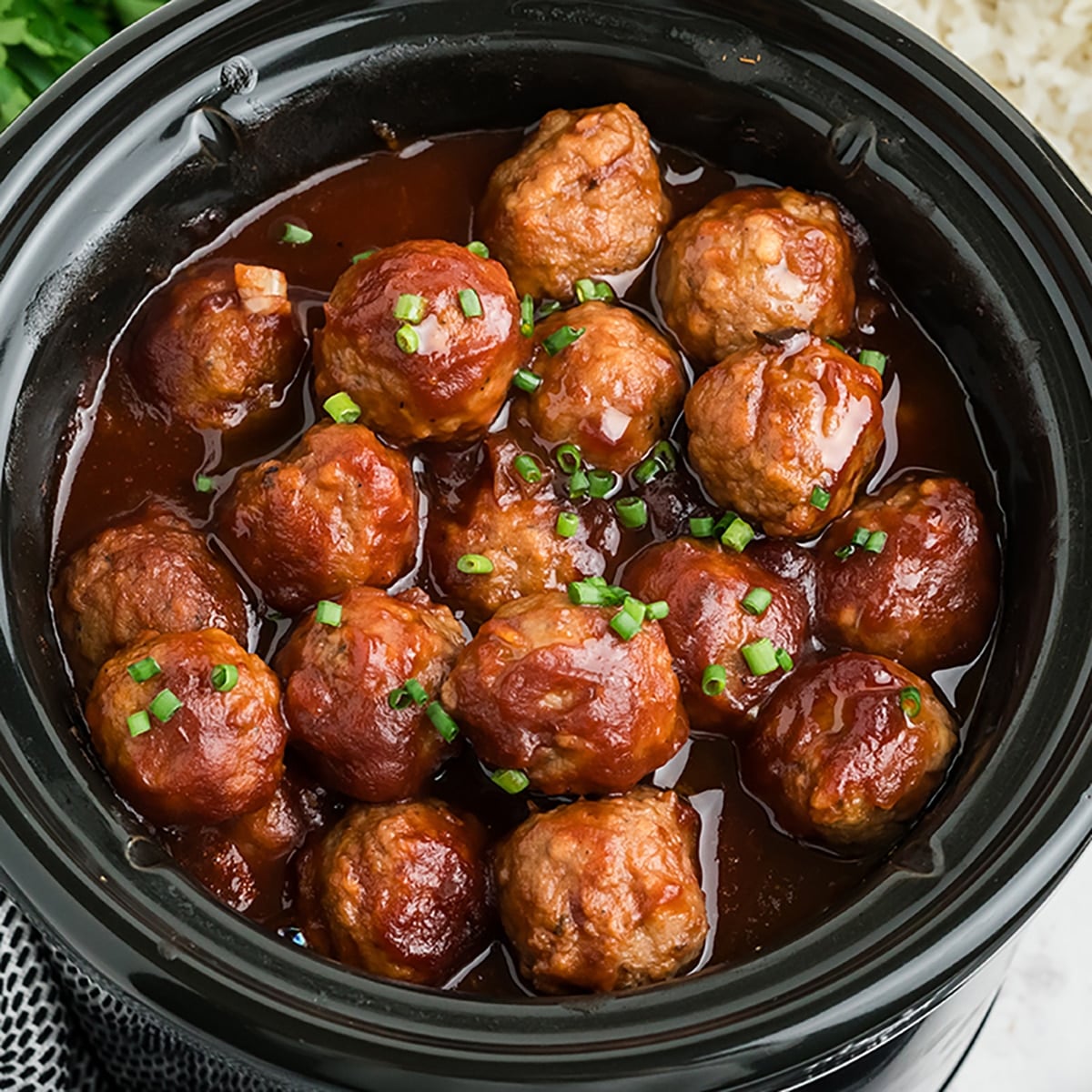 cranberry meatballs in a crockpot.