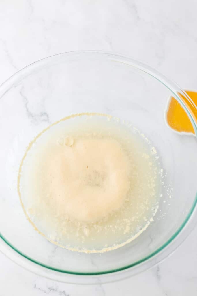 mixing bowl filled with yeast and water.