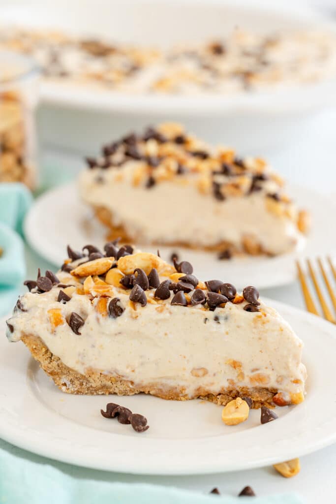 slice of peanut butter pie on a white plate.
