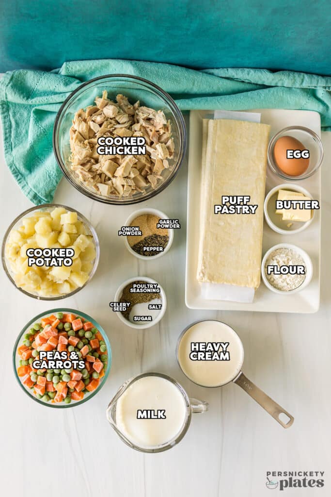 overhead shot of labeled ingredients laid out to make copycat kfc chicken pot pies.