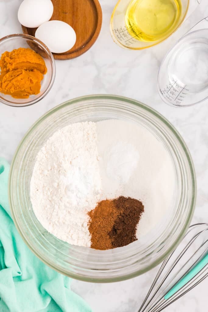 overhead shot of dry ingredients in a bowl to make pumpkin bread.