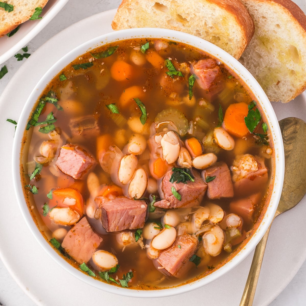 overhead shot of bowl of ham & bean soup.