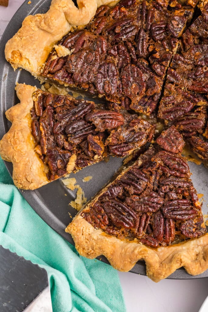 overhead shot of a sliced pecan pie.