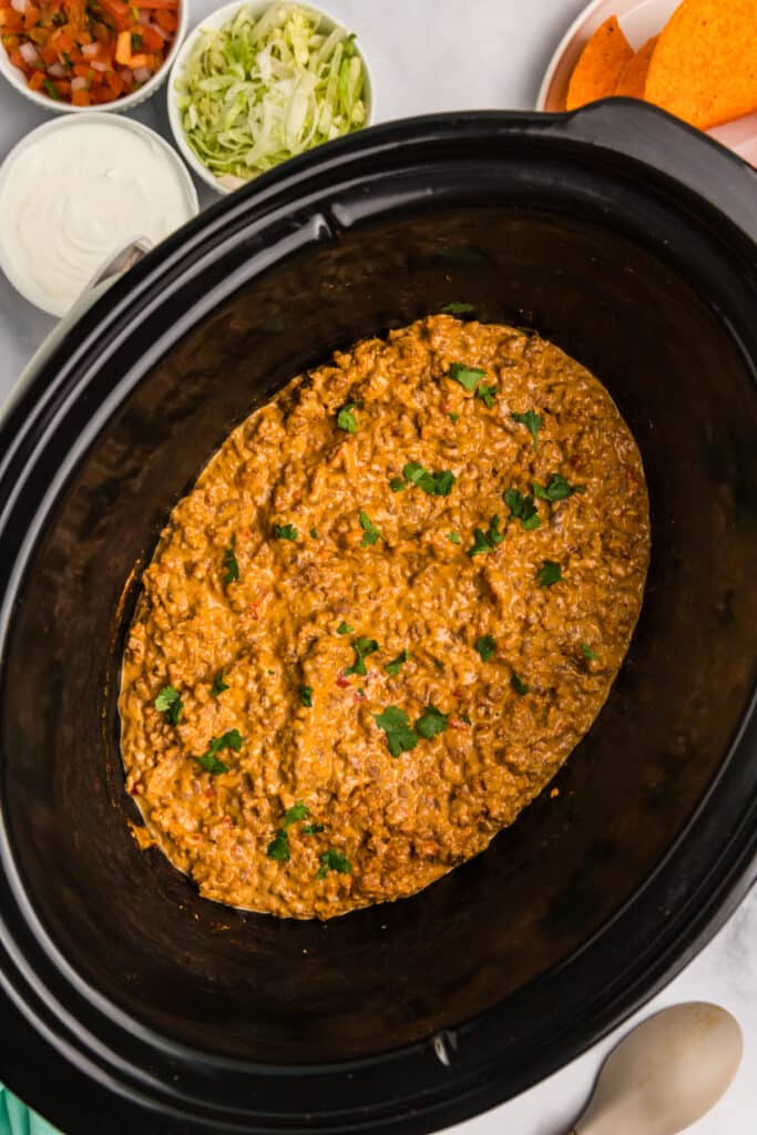 overhead shot of rotel taco mixture in a crockpot.