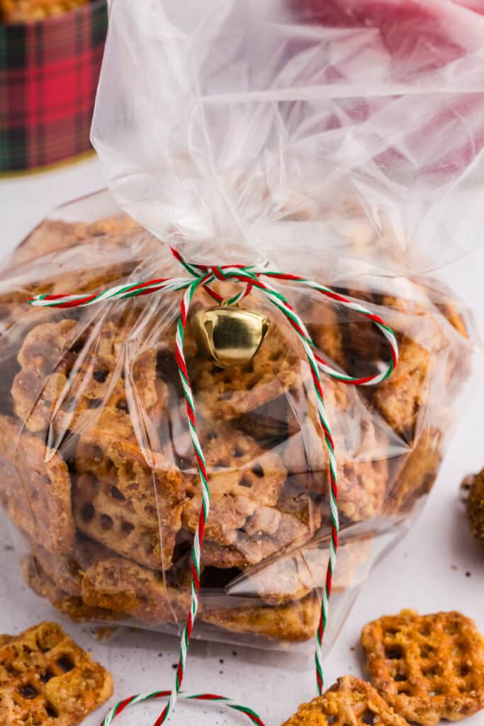 Butter toffee pretzels in a clear gift bag.