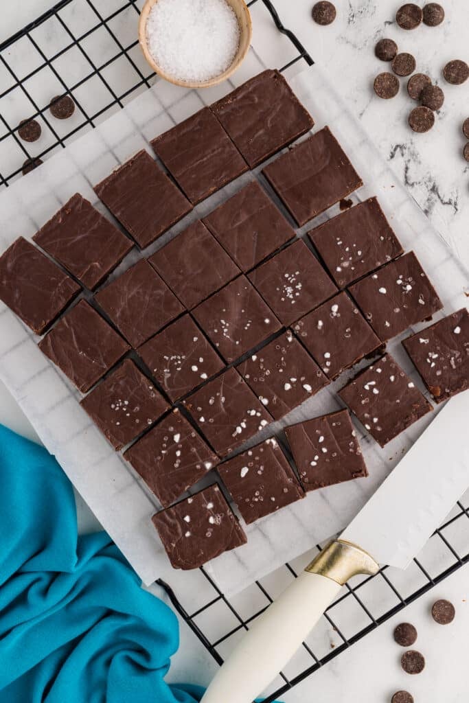 Dark chocolate fudge squares sprinkled with sea salt.