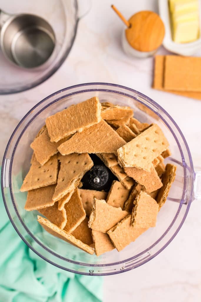 Broken graham crackers in a food processor