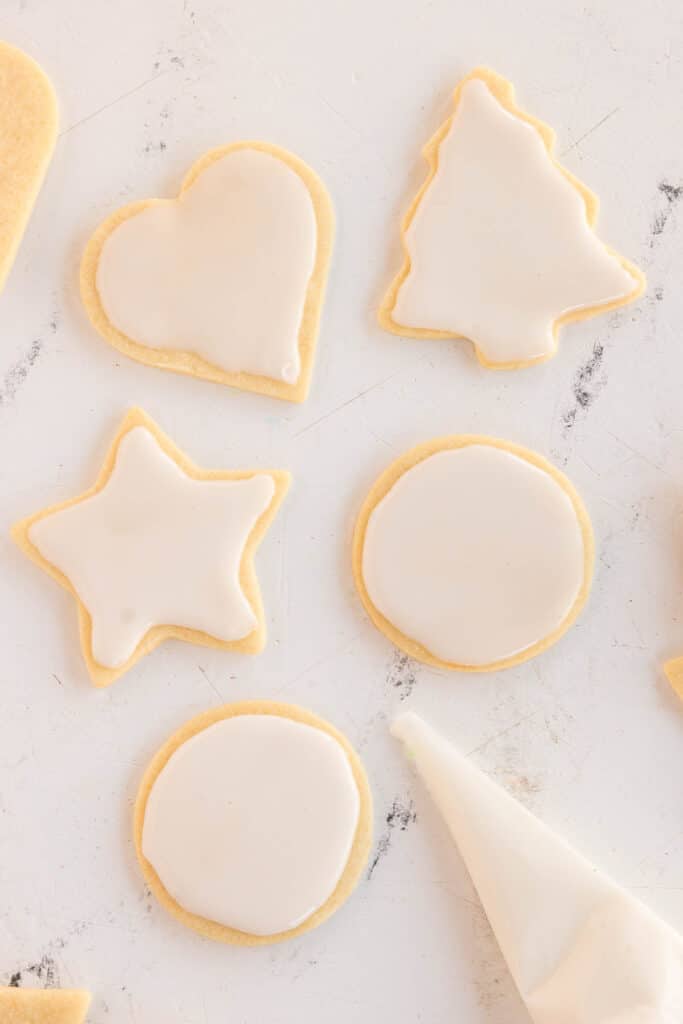 White-iced sugar cookies drying.