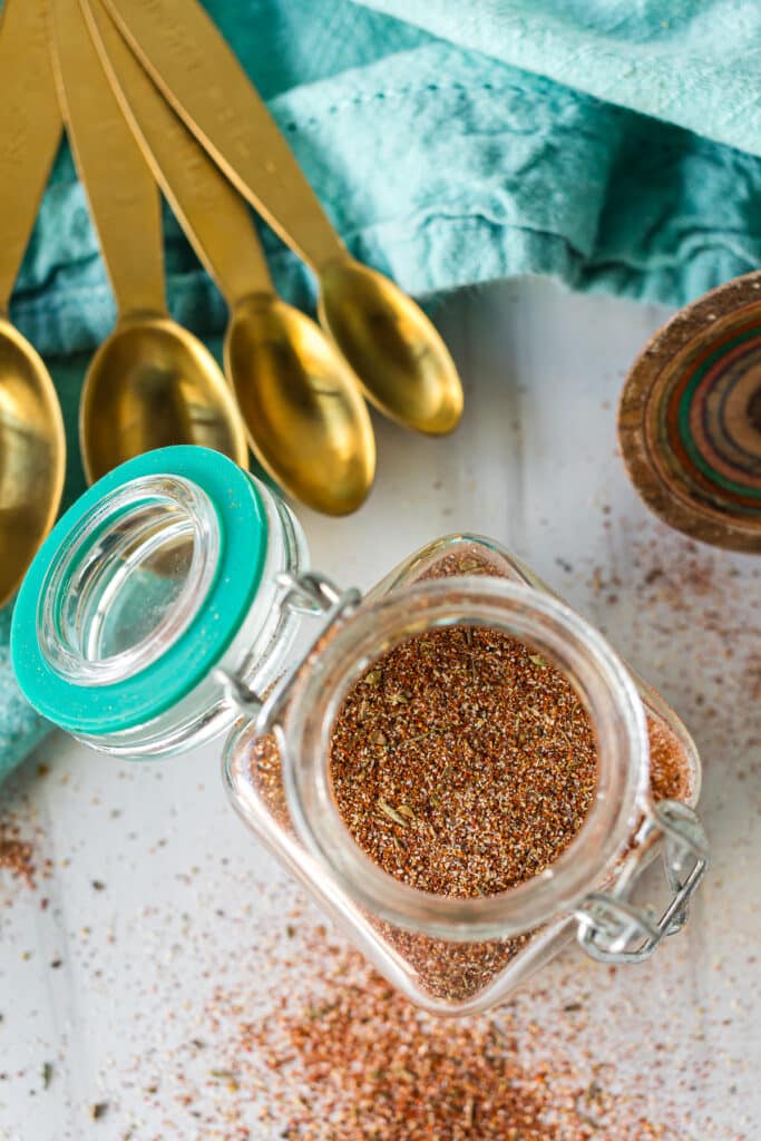 overhead shot of a jar of blackened seasoning in a jar.