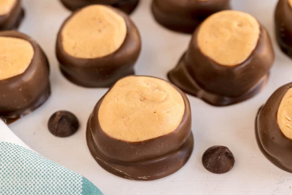 Close-up of chocolate-dipped peanut butter balls.