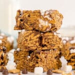 Stack of Golden Grahams s’mores bars topped with mini marshmallows.