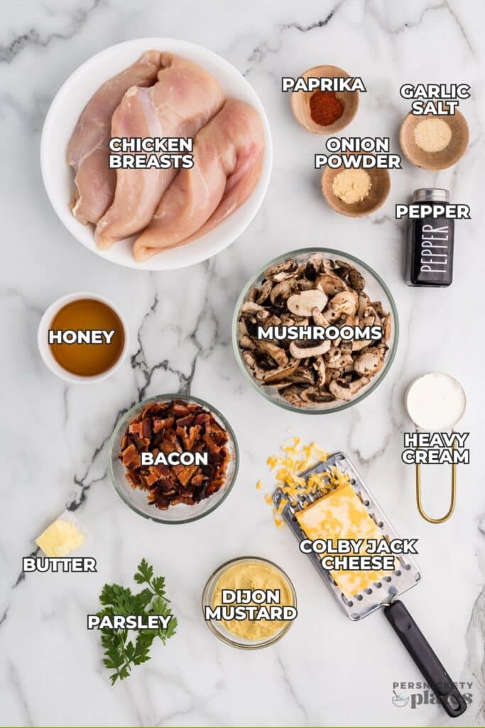 Flat lay of labeled ingredients for Alice Springs Chicken on a marble surface.