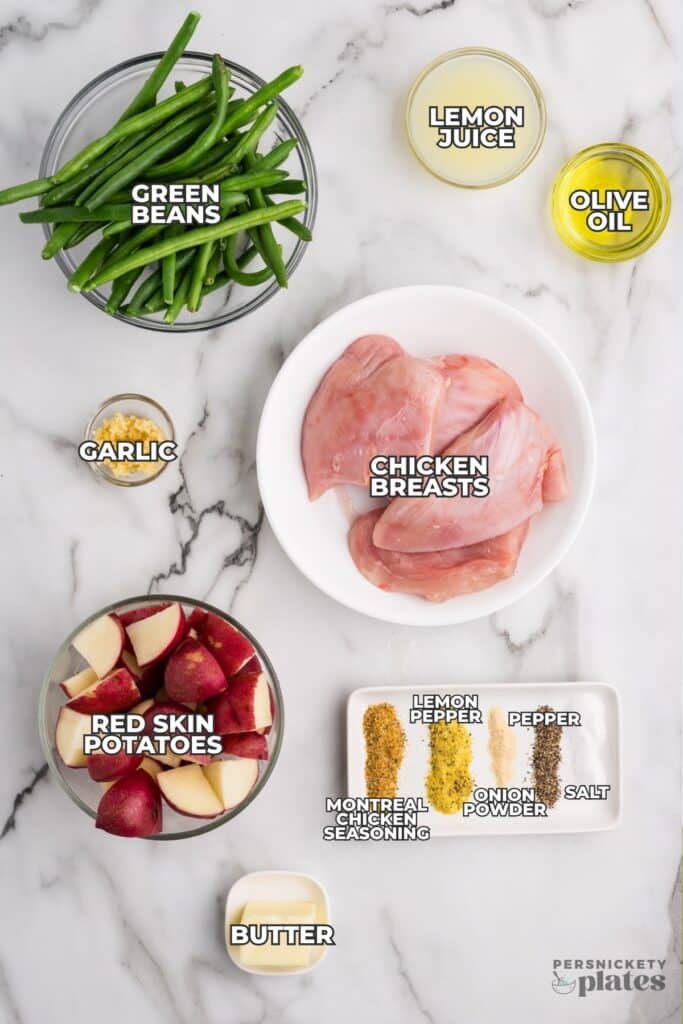 Labeled ingredients on marble surface.